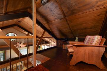 The 'snug' on the mezzanine area is the perfect place to chill out with a good book please note the limited head room.