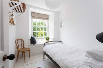The lovely single bedroom is tucked away at the back of the property (Bedroom 2).