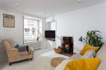 The light and bright sitting-room is a relaxing space, perhaps light the fire and warm your toes.