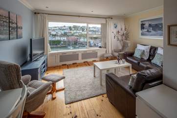 The comfortable living area is great to relax in whilst enjoying the world pass by.