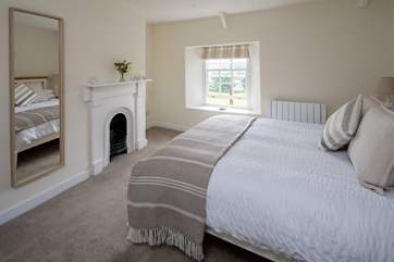 Bedroom 1 is home to this beautiful king-size bed.