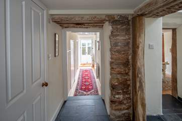 The hallway which runs through the ground floor. Please watch the small steps which lead in and out of the ground floor rooms.