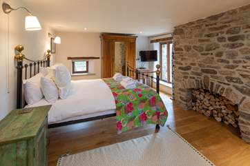 The master bedroom is home to a king-size bed (bedroom 1).