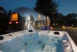 A soak in the bubbling hot tub under the stars is a must.