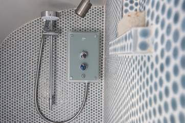 Complete with electric shower.
