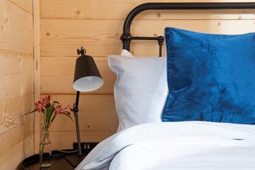 There is a bed-side light for night-time reading.
