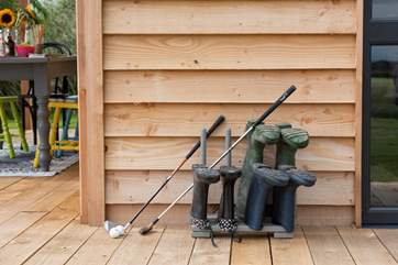 Wellies and golf clubs - essentials at Stibb Hollow Cabin!