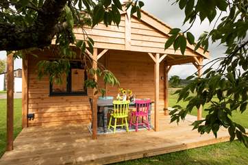Dine inside or outside under the covered deck, the choice is yours.