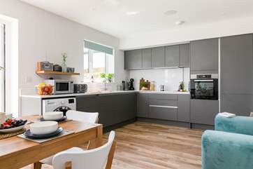 The open plan kitchen area is the perfect place to enjoy long chilled evenings.