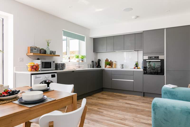 The open plan kitchen area is the perfect place to enjoy long chilled evenings.