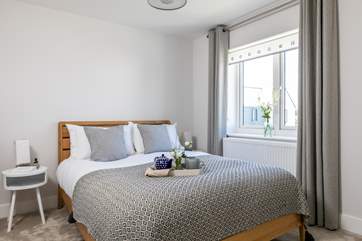 The master bedroom has a super-comfy king-size bed.