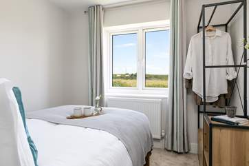 Bedroom 3 overlooks the fields, and you may even spot the local donkey grazing away.