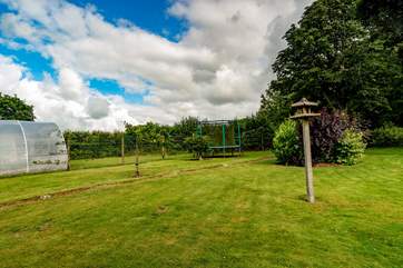 Although the garden is not fully enclosed or private, the owners' patio is to the other side of the bungalow and they very much invite you to enjoy the open space.