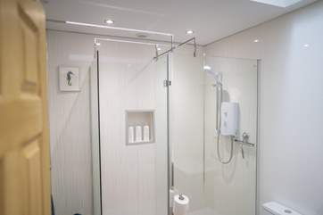 The shower-room is located by the bedroom area.