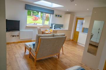 The studio is spacious and airy as light floods through all the windows.