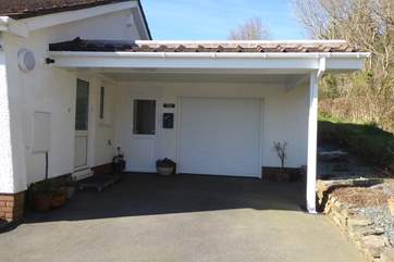 Viewtown Linhay hides at the back of the owners' bungalow this handy carport is your designated parking space. You can also securley store bikes in the garge area.