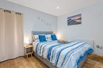 A comfortable king size bed, perfect after a day exploring the area.