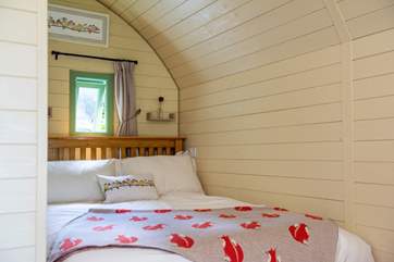 The cosy double bed.