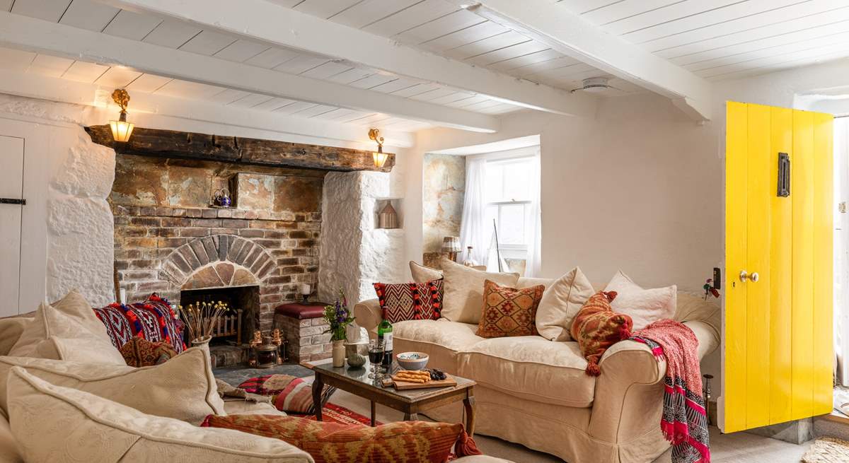 The cosy sitting-room looks into the pretty courtyard.