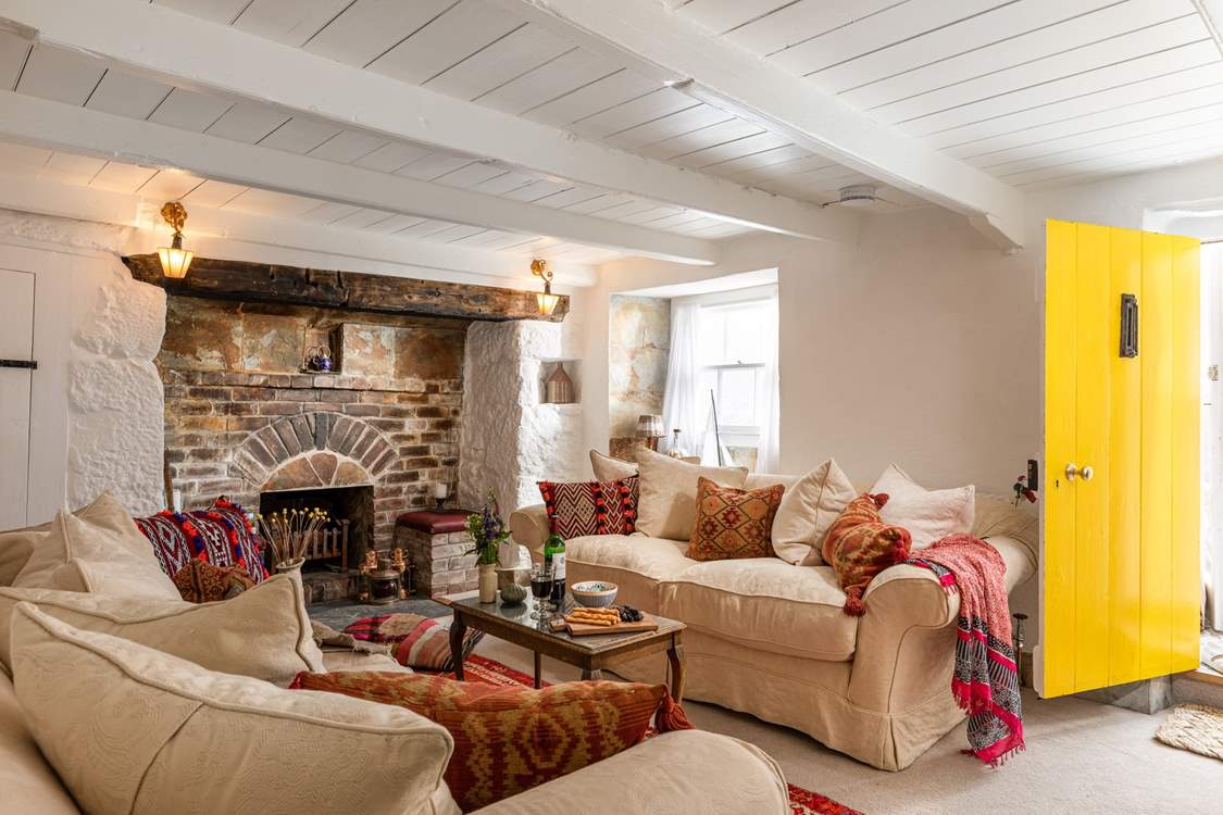 The cosy sitting-room looks into the pretty courtyard.