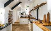 The fabulous kitchen awaits, please take care with the sloping ceilings and low door here.  - Thumbnail Image