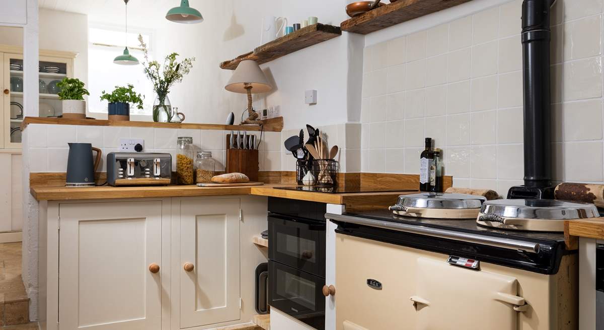 There is an electric oven and hob and an oil-fired Aga, which is on in the winter months. 