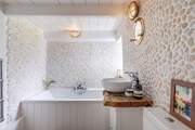 The family bathroom can be found on the ground floor.