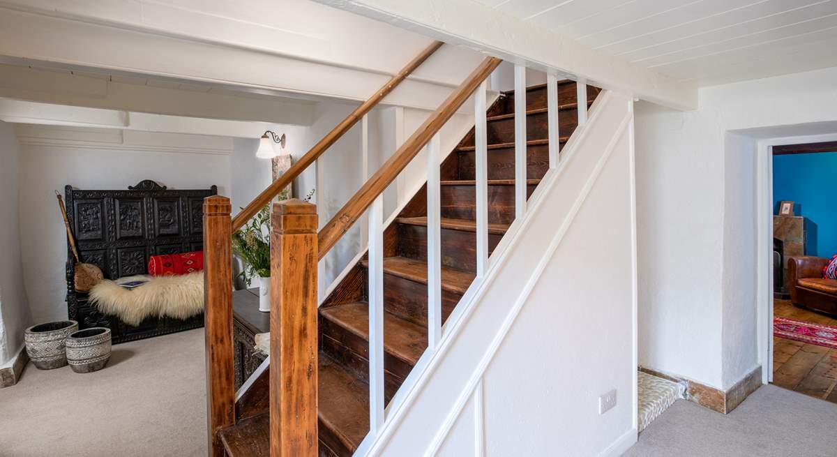 The stairs lead up to the three double bedrooms. 