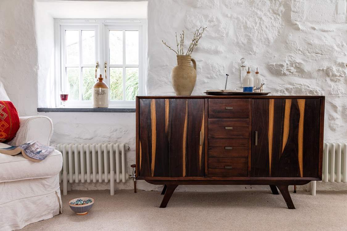 Fabulous vintage items - the perfect place for your cocktail shaker and glasses.