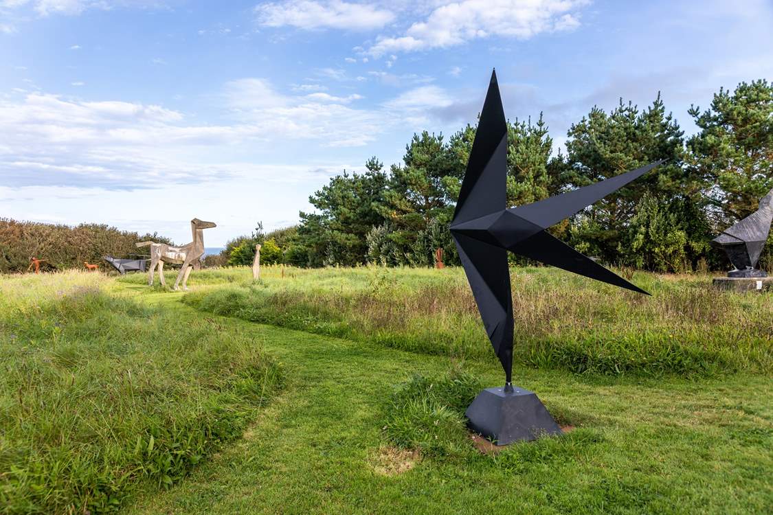 Wander along the coast path and find Terence Coventry Sculpture Park. 