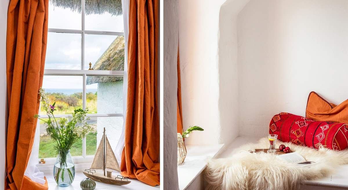 Sit in a cosy corner of the main bedroom, try not to get distracted by the sea view. 