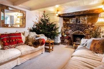 The cosy sitting-room looks into the pretty courtyard.