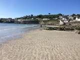 The beach in Coverack at mid tide.