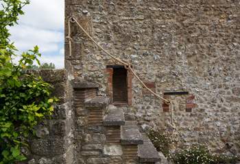 These original external steps are quite steep so please take care and use the rope handrail. The area you can see on the left-hand side, at the top of the steps, is not enclosed so please be mindful not to go too close to the edge.