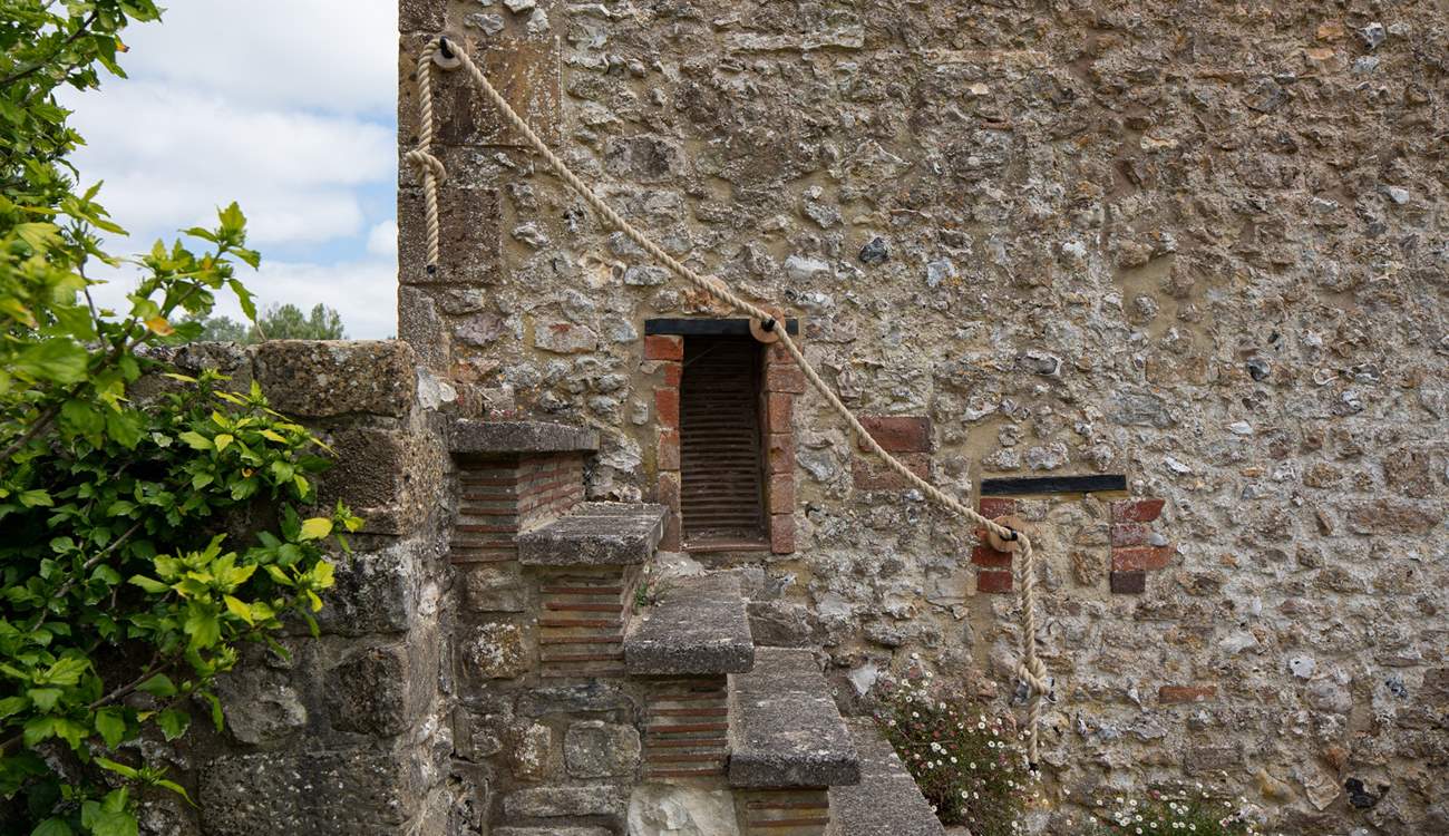 These original external steps are quite steep so please take care and use the rope handrail. The area you can see on the left-hand side, at the top of the steps, is not enclosed so please be mindful not to go too close to the edge.