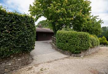 Up this slight incline and to the right is the parking area.