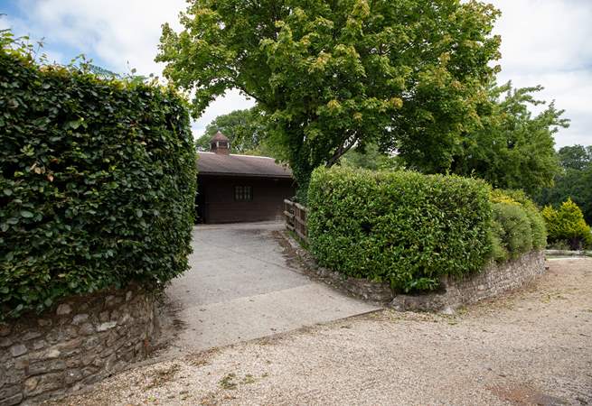 Up this slight incline and to the right is the parking area.