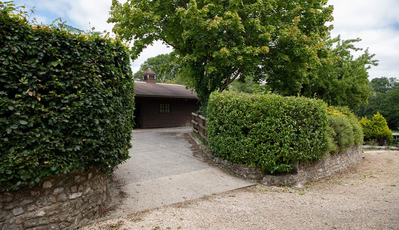 Up this slight incline and to the right is the parking area.