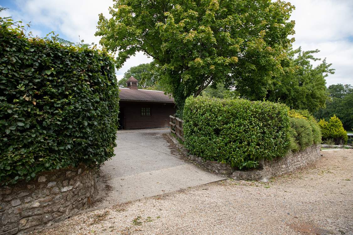 Up this slight incline and to the right is the parking area.