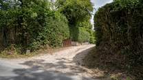 The driveway entrance to The Old Mill (signed Metford Mill).