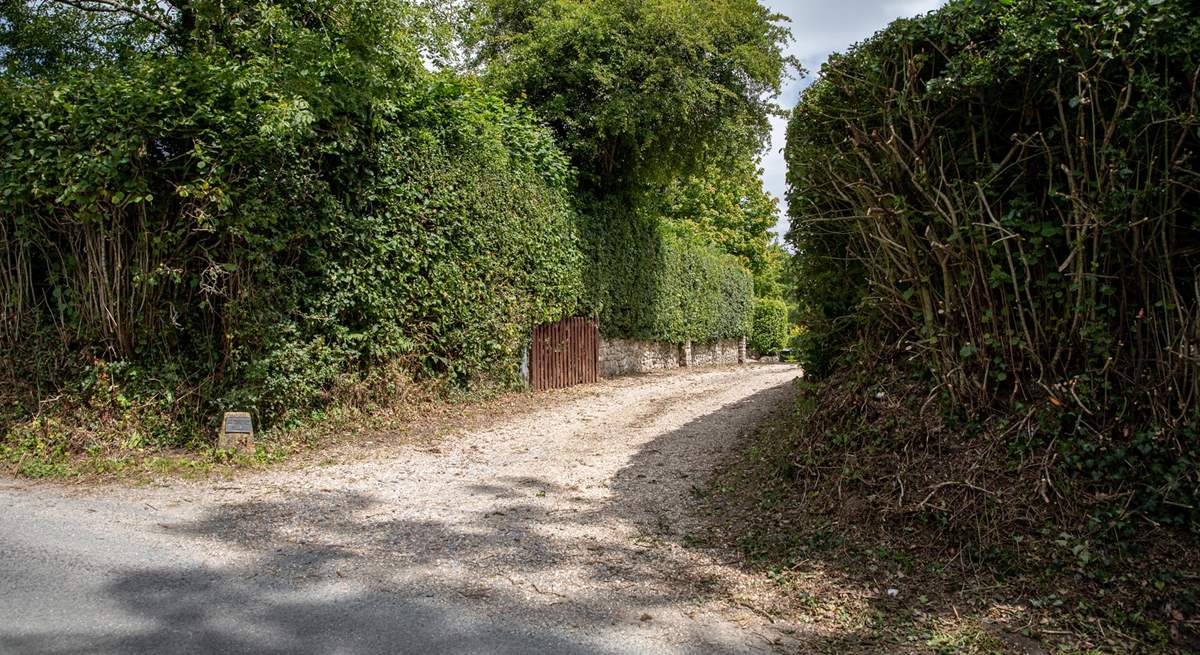 The driveway entrance to The Old Mill (signed Metford Mill).