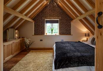 Relaxing in this bedroom will be a pure delight.