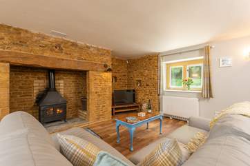 Light the fire and relax in this gorgeous sitting-room.