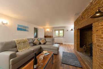 The L-shaped sofa offers plenty of space for everyone to relax.