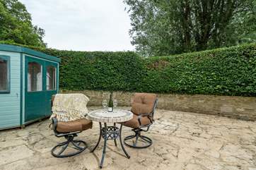 As well as the lawned garden, there is also a sunny terrace to enjoy.