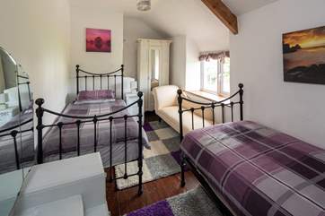 Bedroom 2 is home to these lovely single beds.