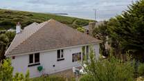 Aerial view from the top balcony overlooking the house and out to sea. Glorious even on a gloomy day.