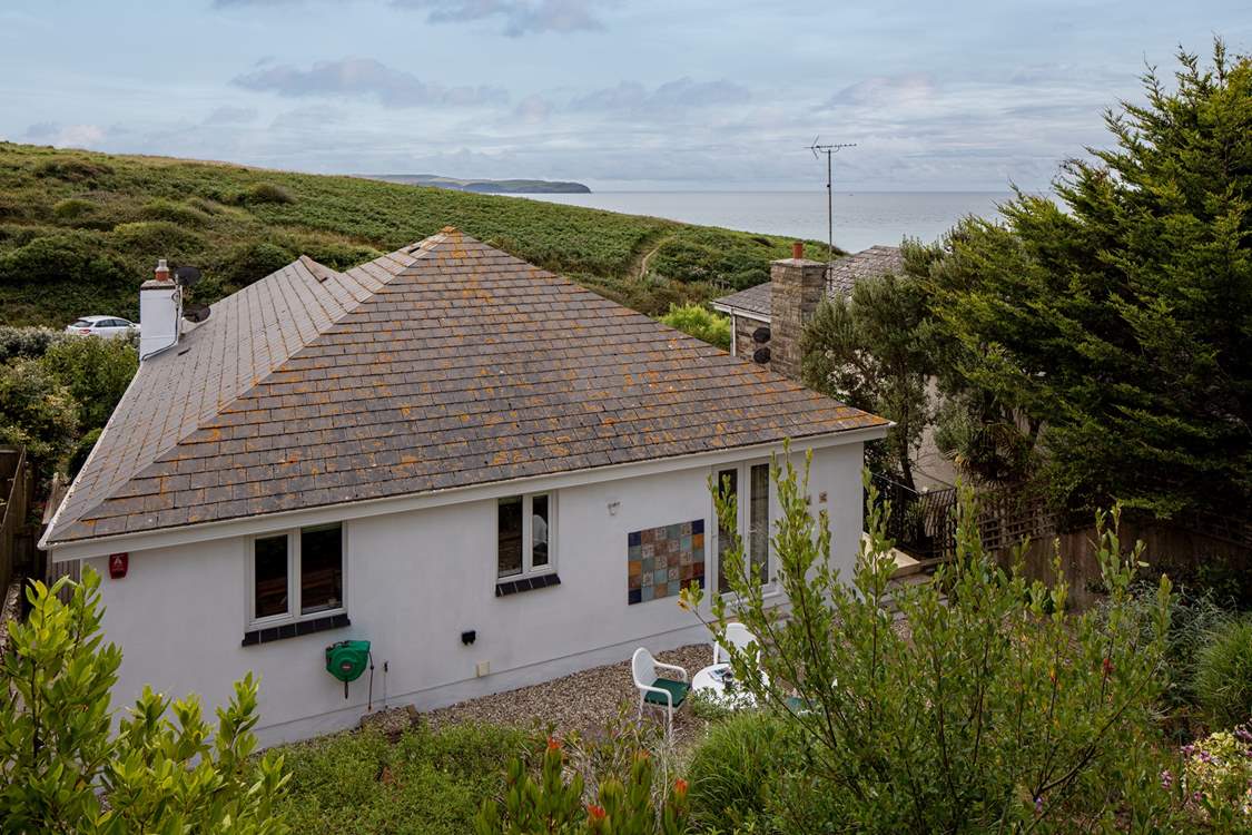 Aerial view from the top balcony overlooking the house and out to sea. Glorious even on a gloomy day.