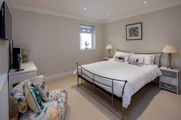 Bedroom 4 offers a king-size bed.