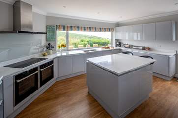 The kitchen is fully equipped with all mod-cons and offers oodles of space to whip up a feast.